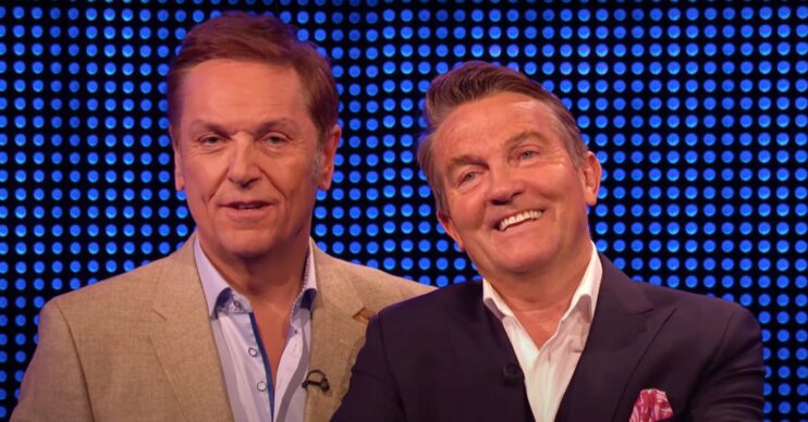 Brian Conley and Bradley Walsh smiling on The Chase