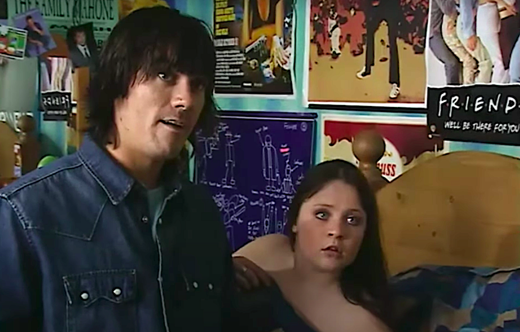 Cain and teenager Ollie Reynolds look shocked when their romance is discovered