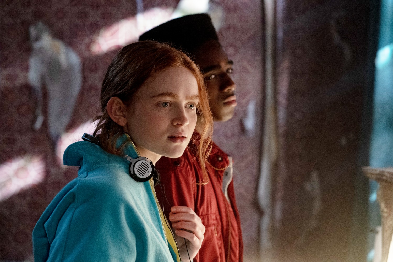 Lucas and Max look confused in Stranger Things season 4