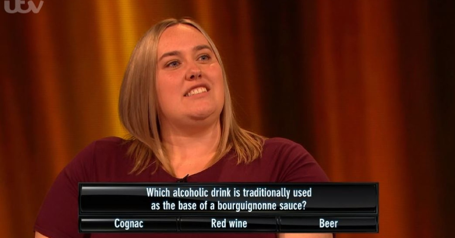 Contestant Claudia looks at question on Tipping Point