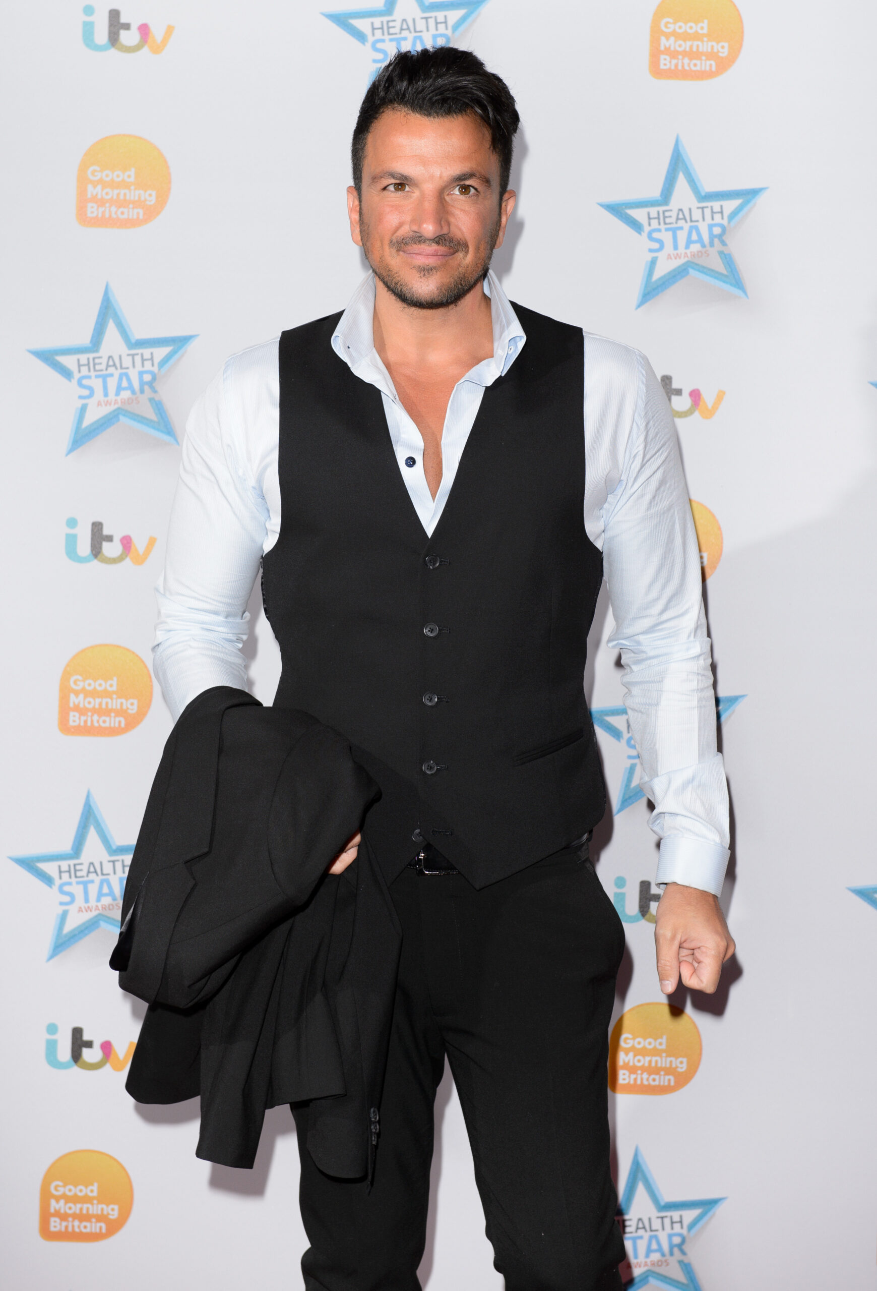 Peter Andre in a suit on the red carper
