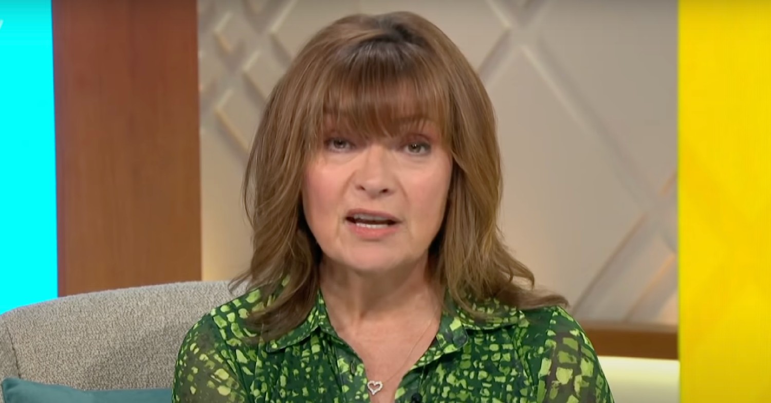 Lorraine Kelly in green patterned blouse on her show
