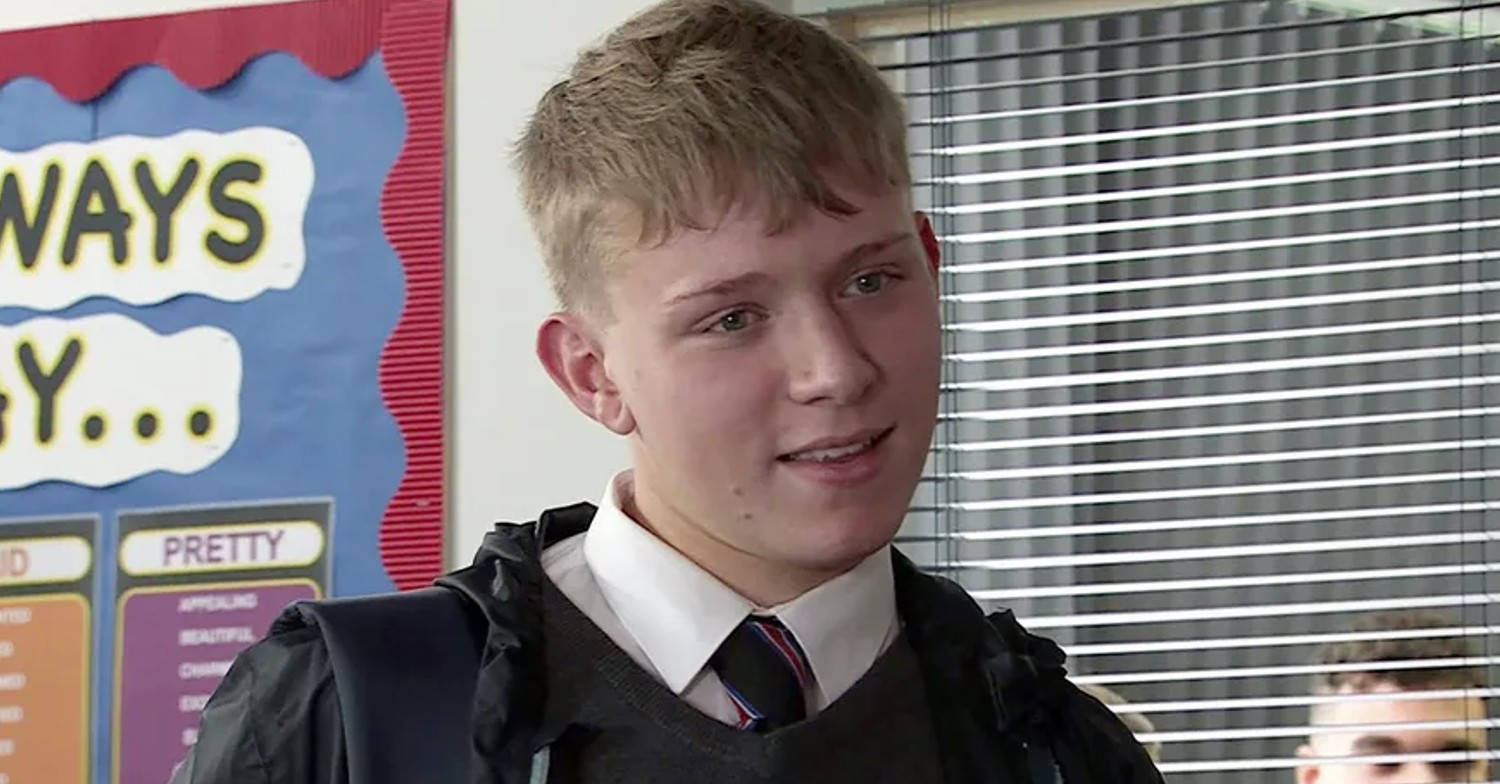 Max Turner smiles in his school uniform in Corrie (Credit: ITV)
