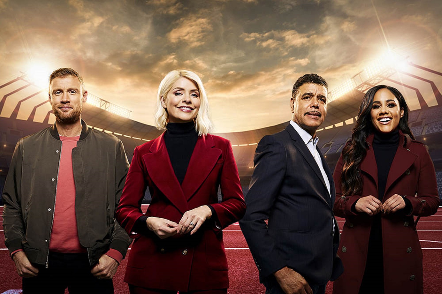 Holly Willoughby smiling with her co-hosts on ITV series The Games