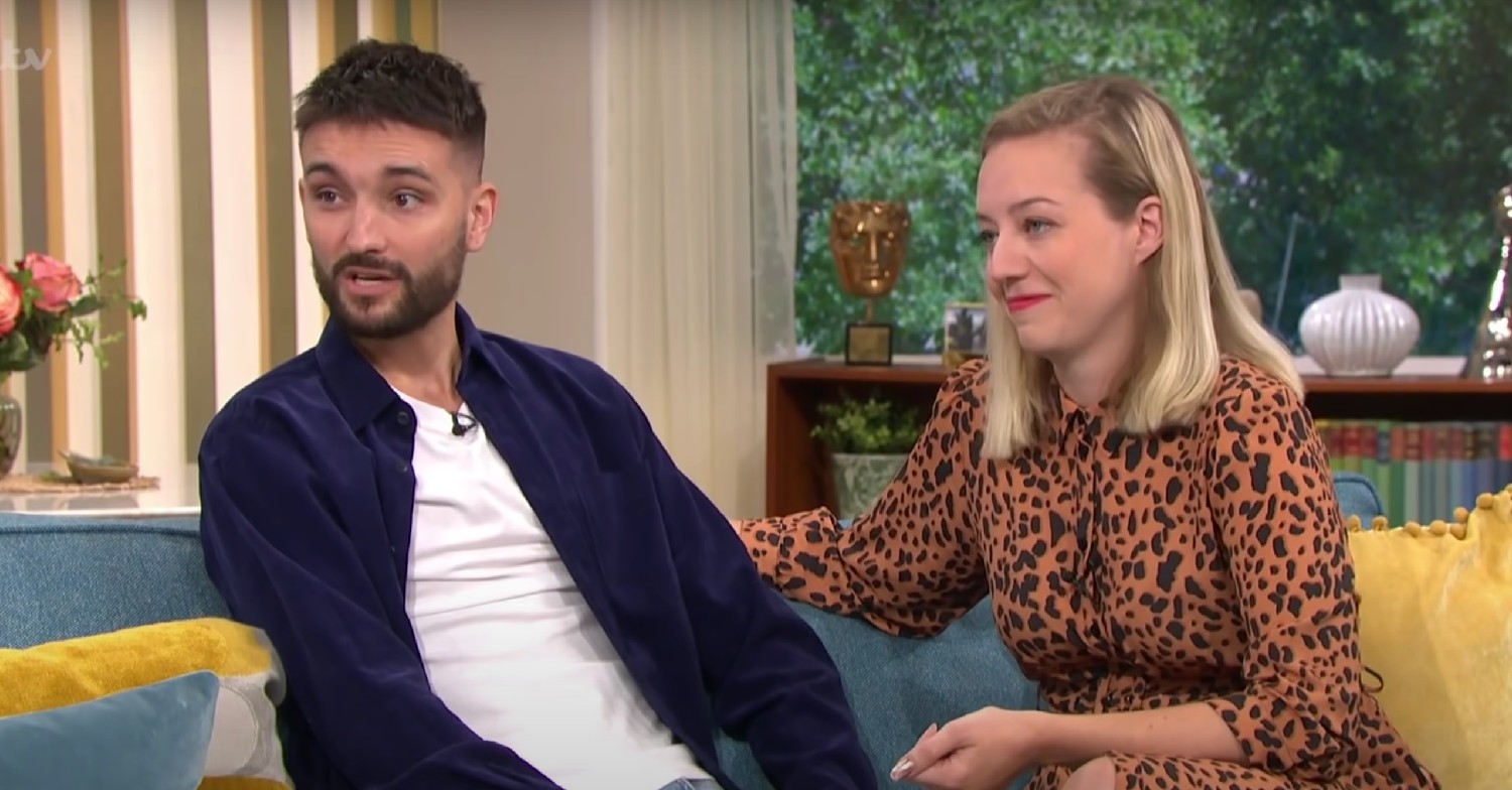 Tom Parker speaking on This Morning. Kelsey Parker sits next to him, smiling