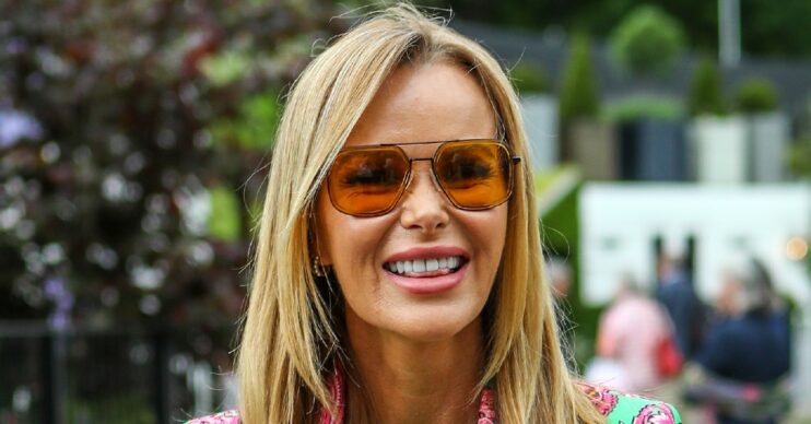 Amanda Holden smiles with sunglasses on at 2022 Chelsea Flower Show