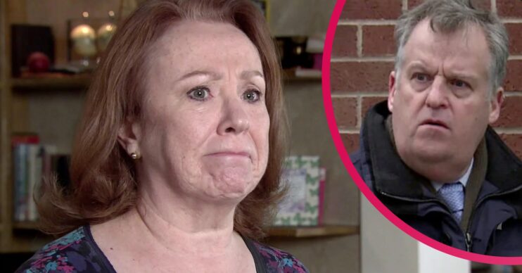 Coronation Street Cathy looks worried while Brian looks on.