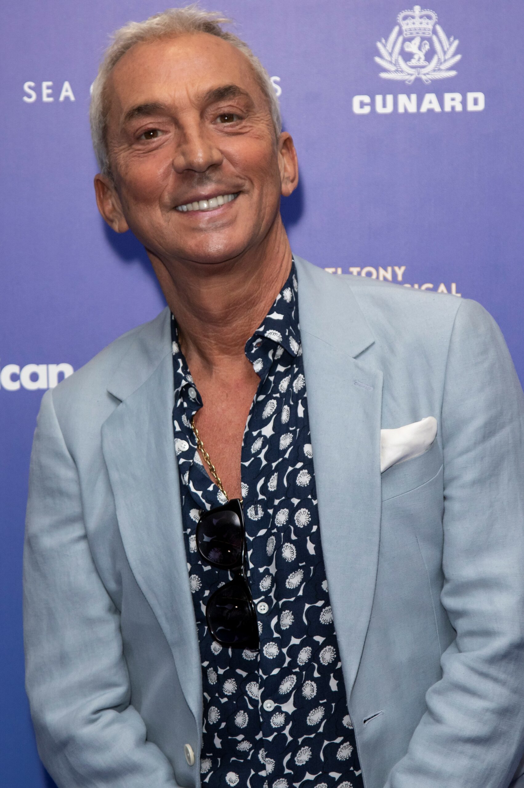 Strictly judge Bruno Tonioli smiles in blue blazer jacket at event
