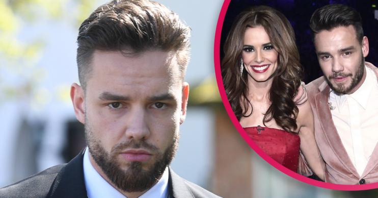 Liam Payne looking glum and smiling with Cheryl
