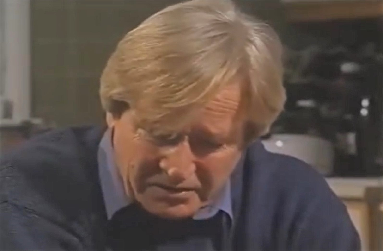 Ken Barlow looks upset with his head bowed in Classic Coronation Street