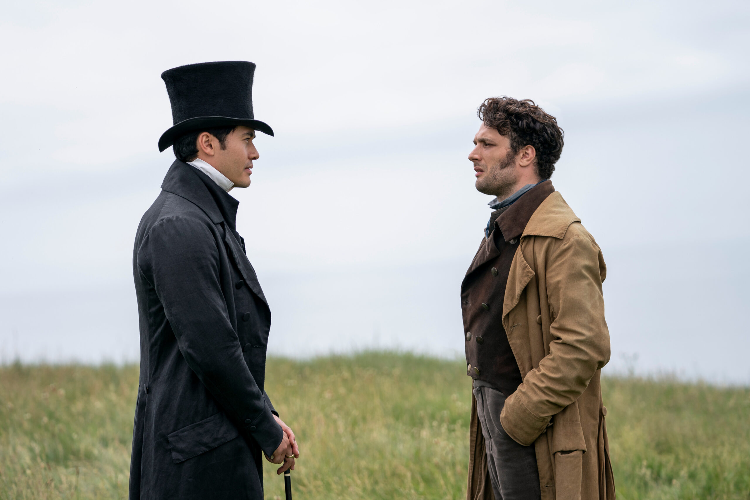 Cosmo Jarvis and Henry Golding star as Wentworth and Elliot stare each other downin Persuasion