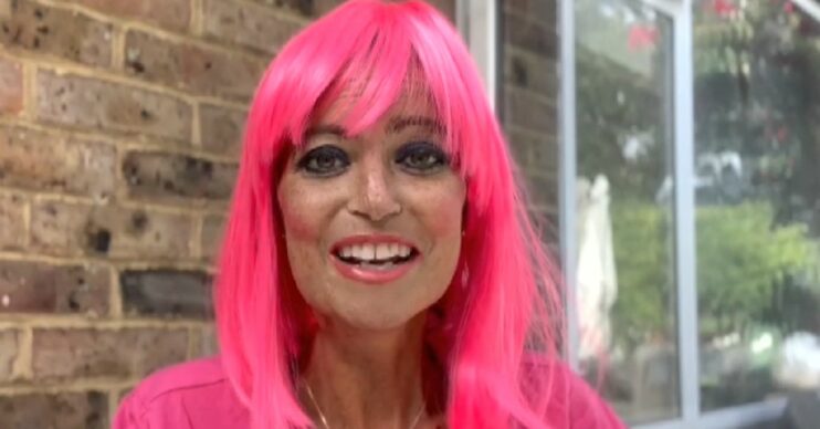 Deborah James smiling in pink wig during video message on Lorraine today