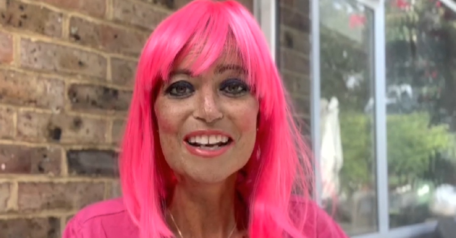 Deborah James smiling in pink wig during video message on Lorraine today