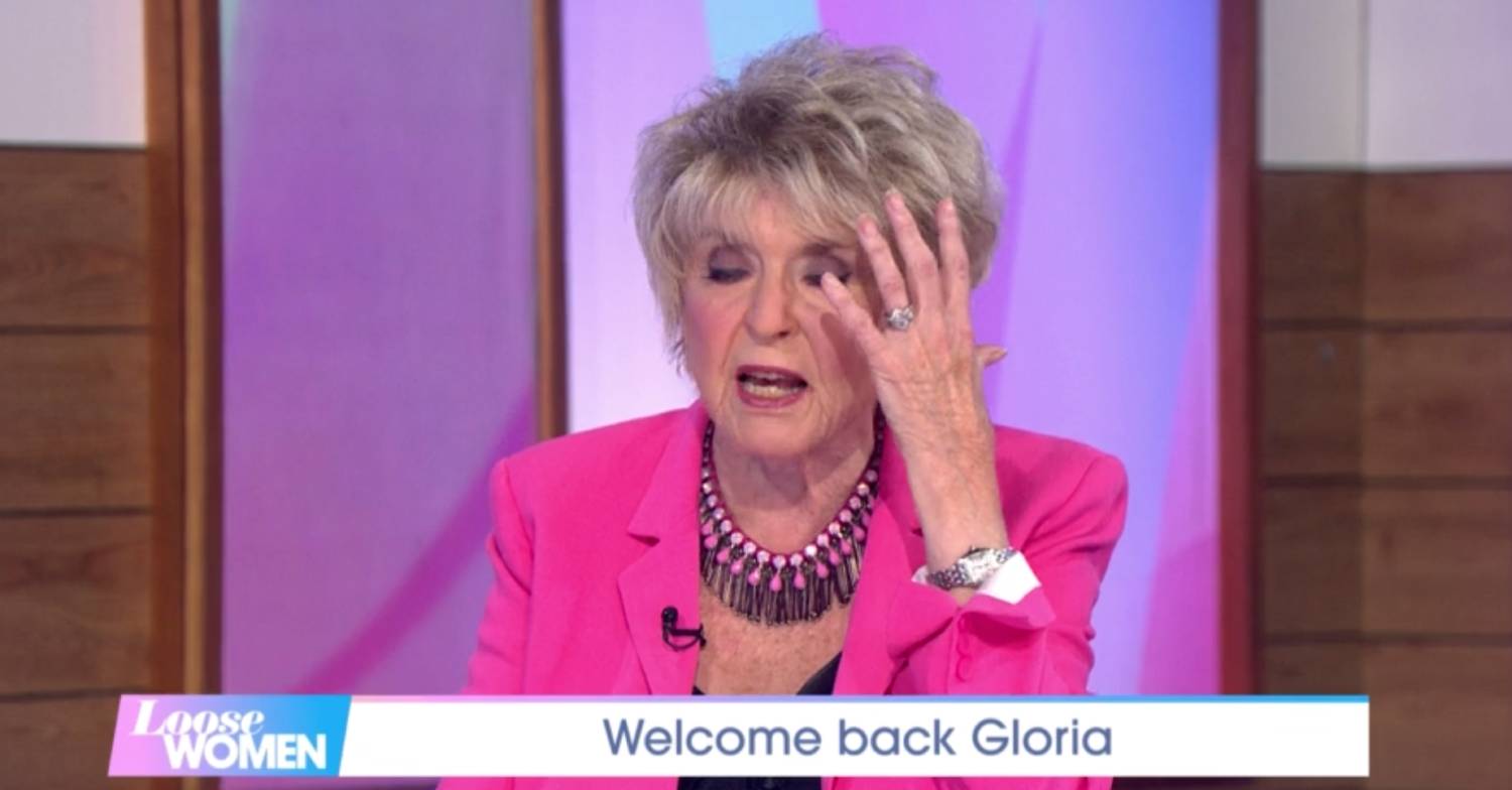 Gloria Hunniford holding her hand up to her face on Loose Women