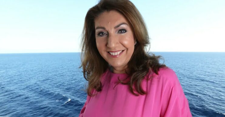 Jane McDonald wearing pink pictured at sea