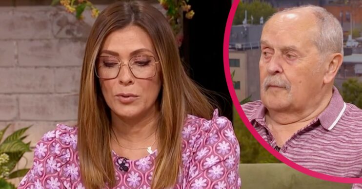 Kym Marsh looks down and her dad looks to the side