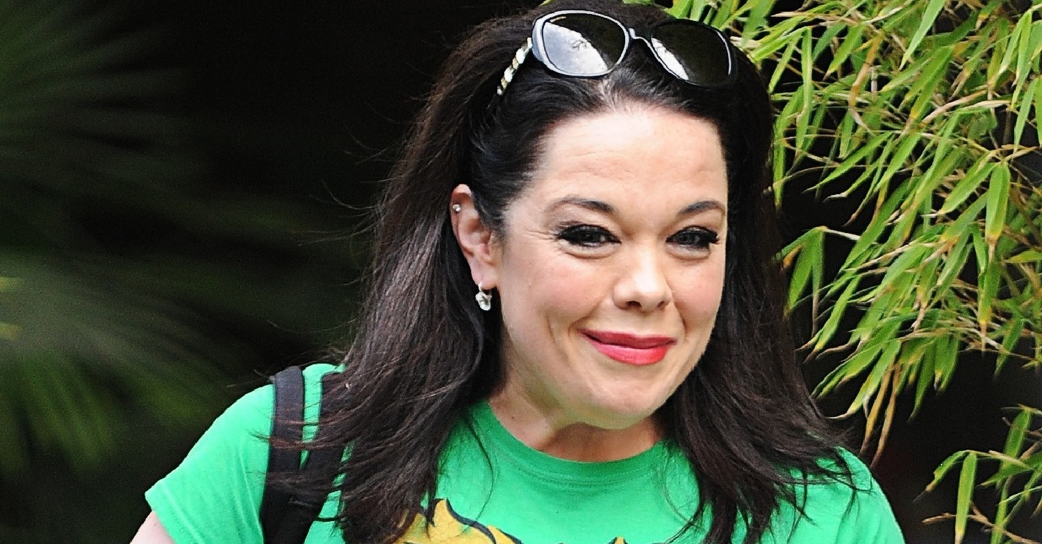 Lisa Riley in green t-shirt and sunglasses outside ITV STudios