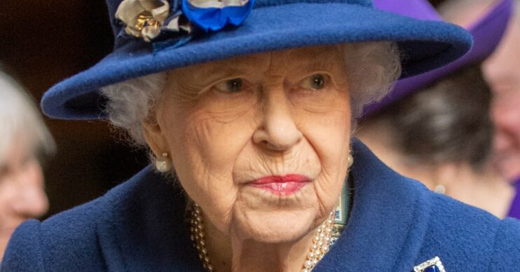 The Queen looks serious in all blue outfit during royal engagement