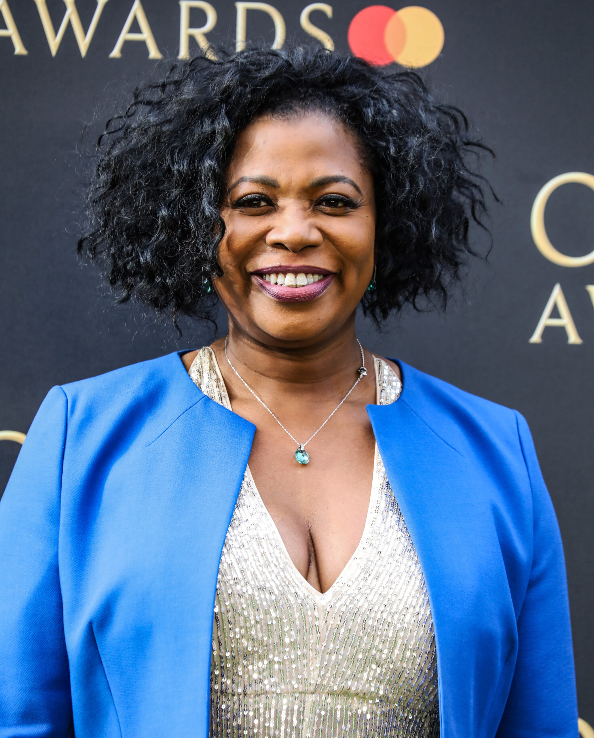 Brenda Edwards smiling on the red carpet