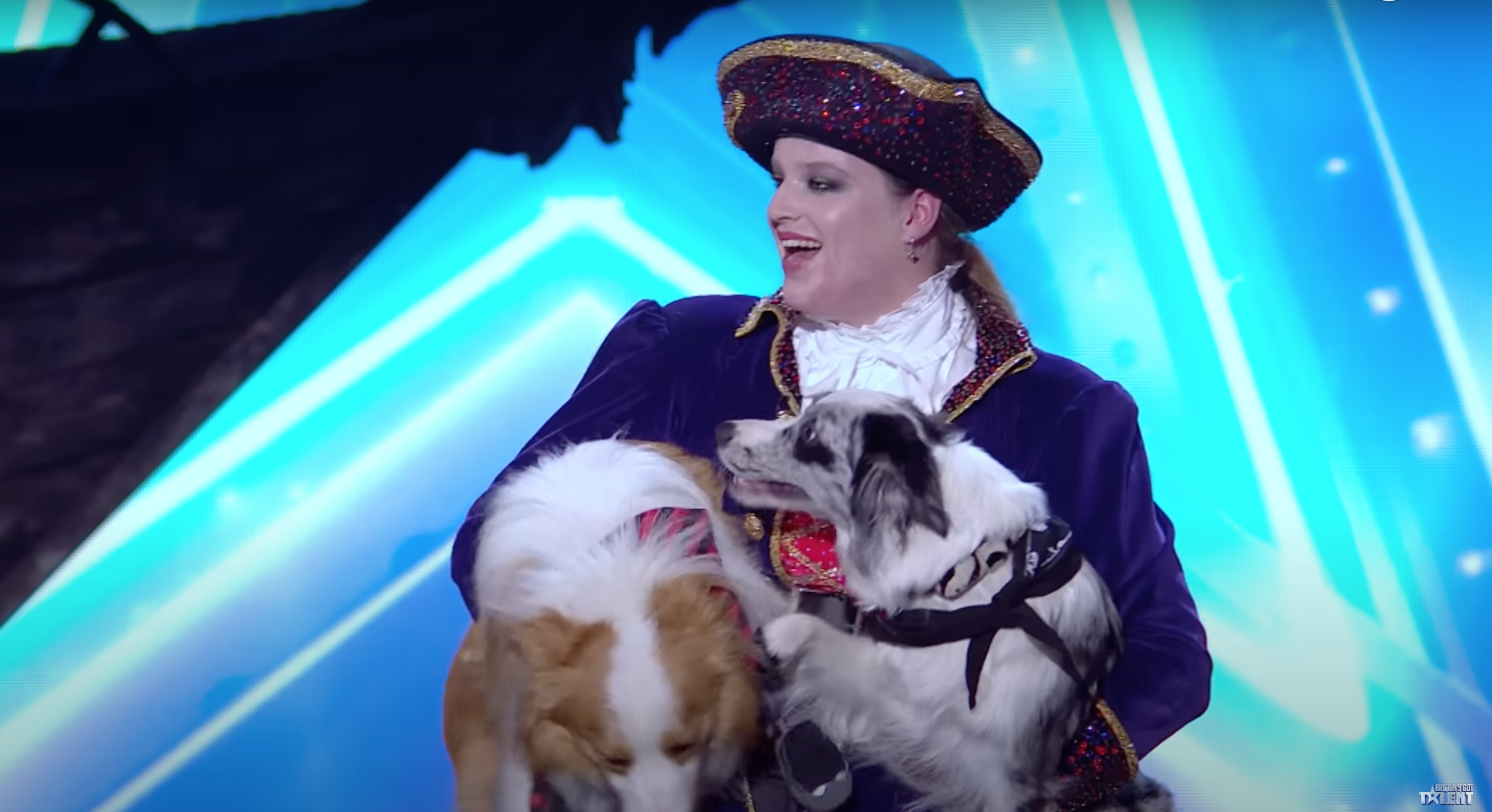 Amber dressed as a pirate with her dogs on BGT