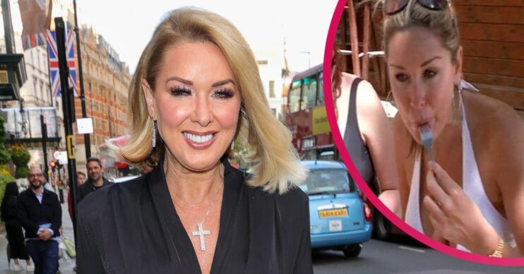 Claire Sweeney smiling and eating her dinner