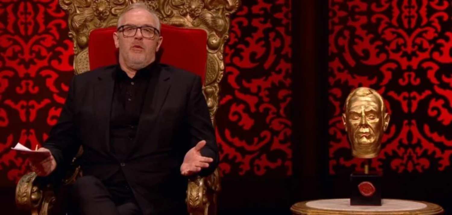 Greg Davies hosting Taskmaster in his red throne chair