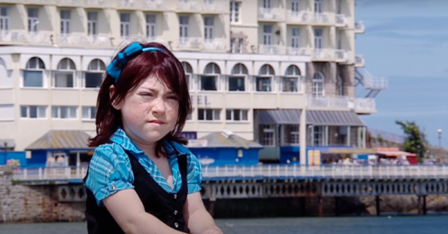 Jasmine Burkitt squinting at the camera on Small Teen Bigger World