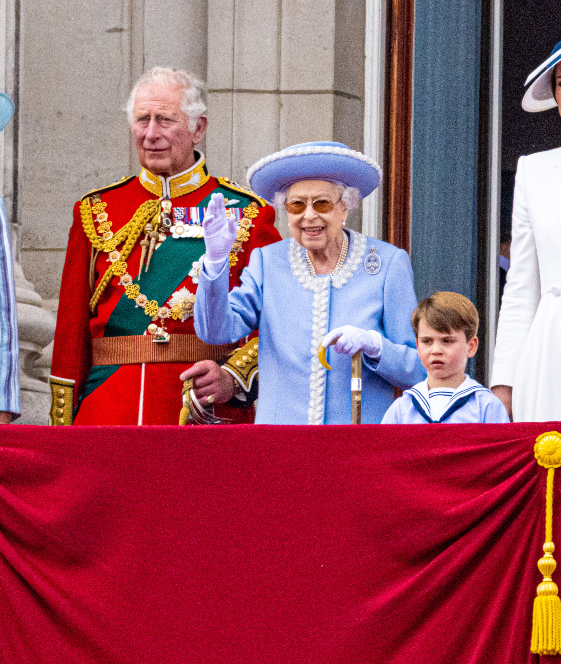 The Queen waving on the balcony at Buckingham Palace