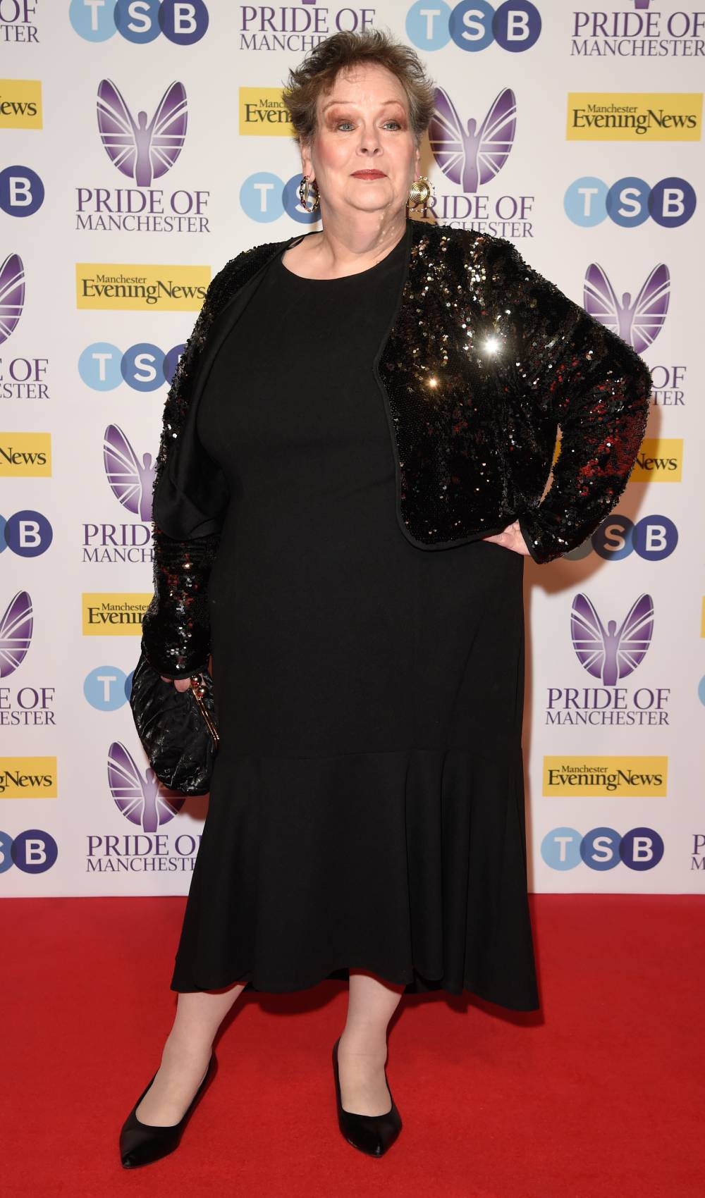 Anne Hegerty poses at a red carpet event