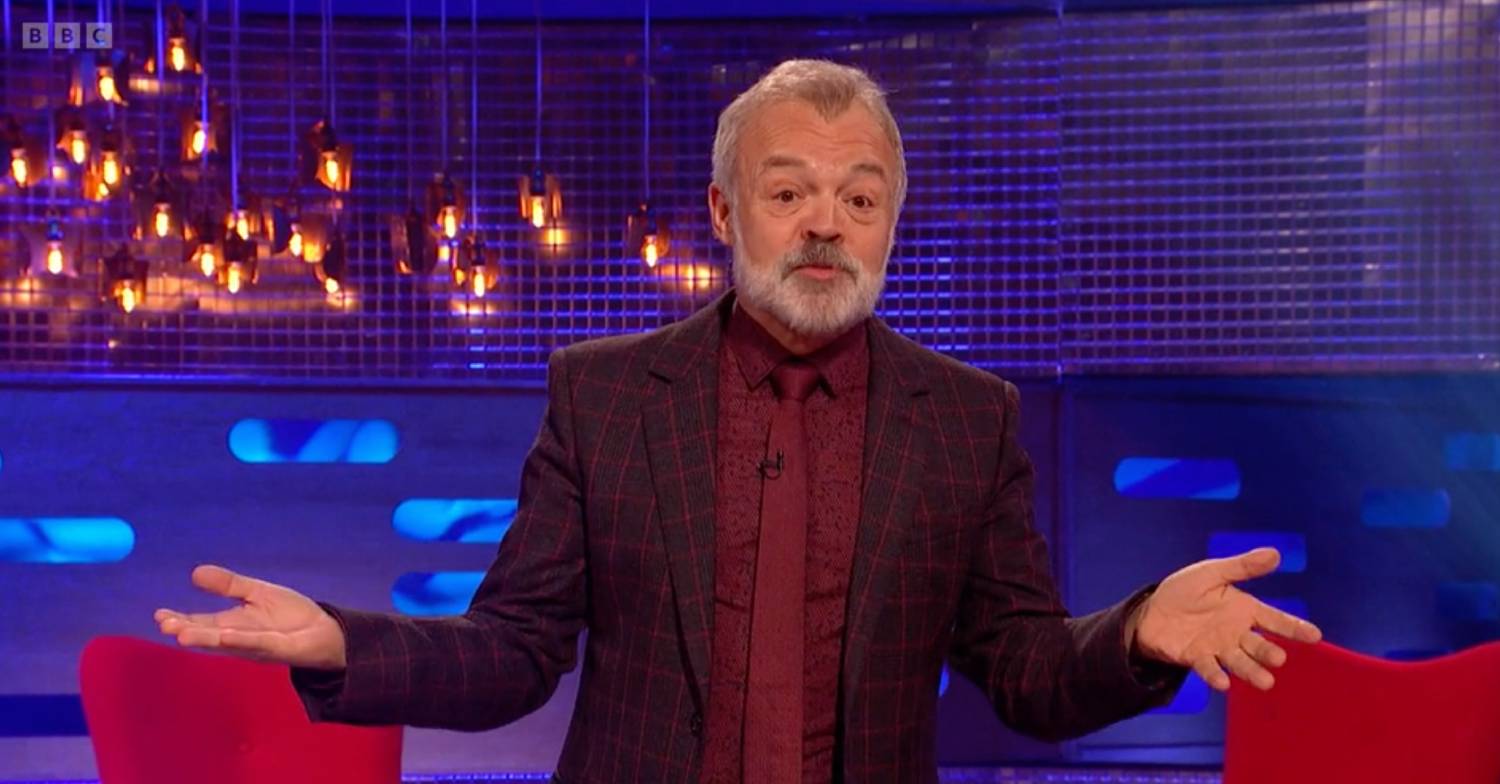 Graham Norton holds his hands out