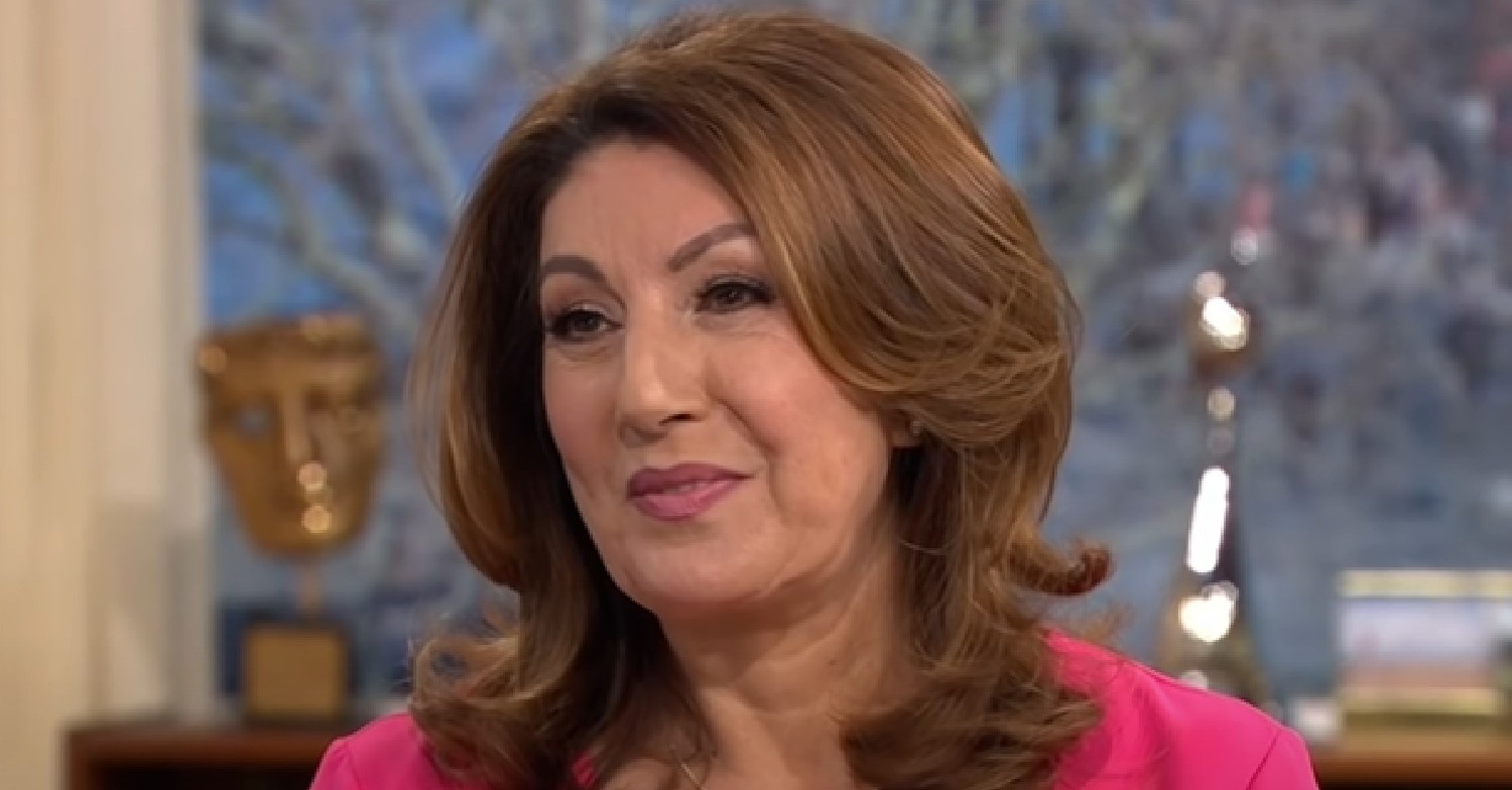Jane McDonald in pink top, smiling on This Morning