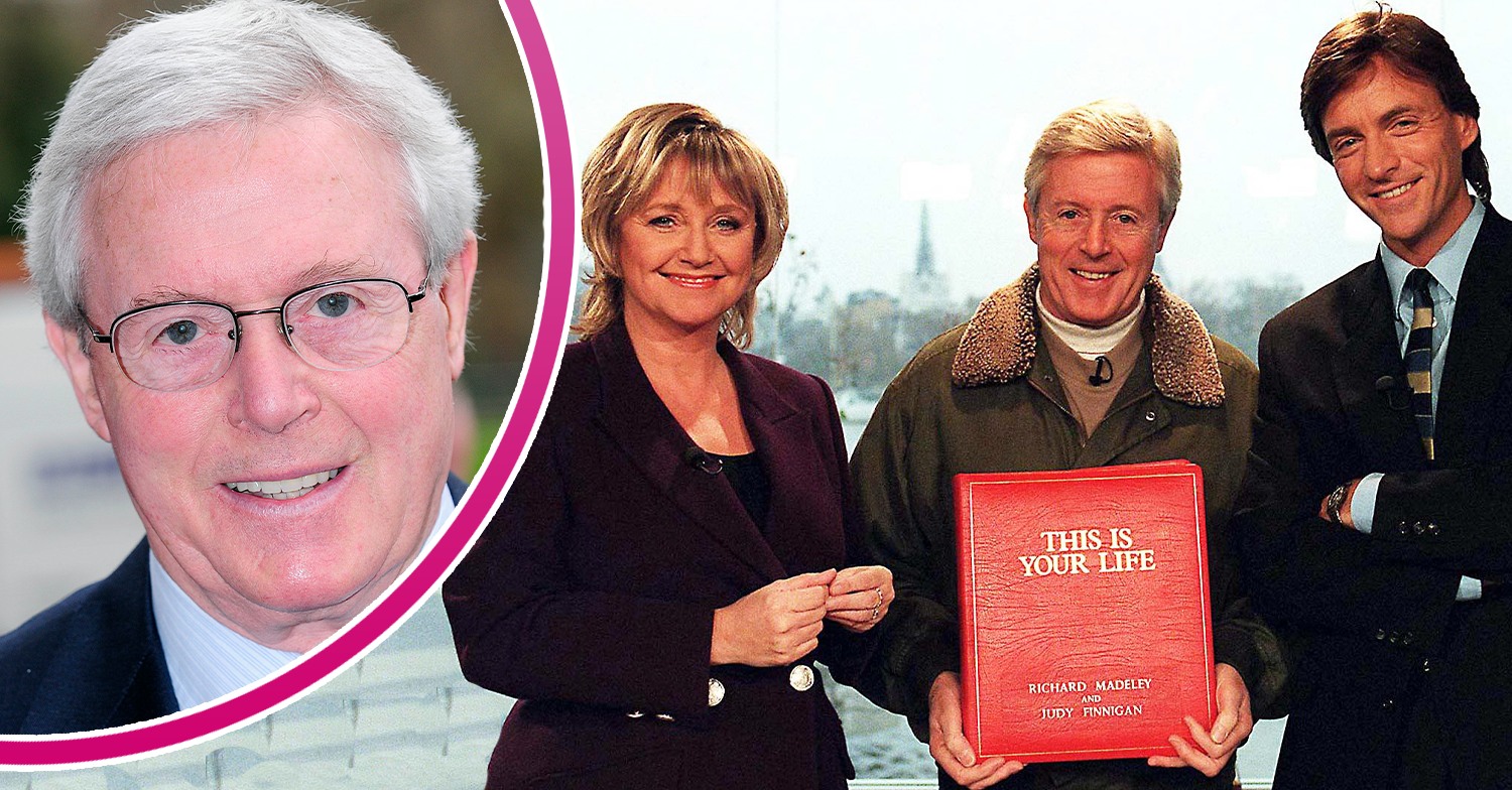 Michael aspen holding his big red book with Richard and Judy