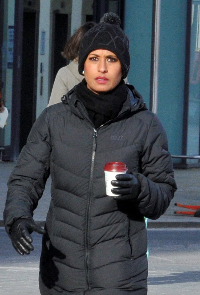 BBC Breakfast star Naga Munchetty in coat and hat leaving studios