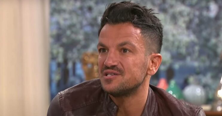 Peter Andre speaks during a TV appearance