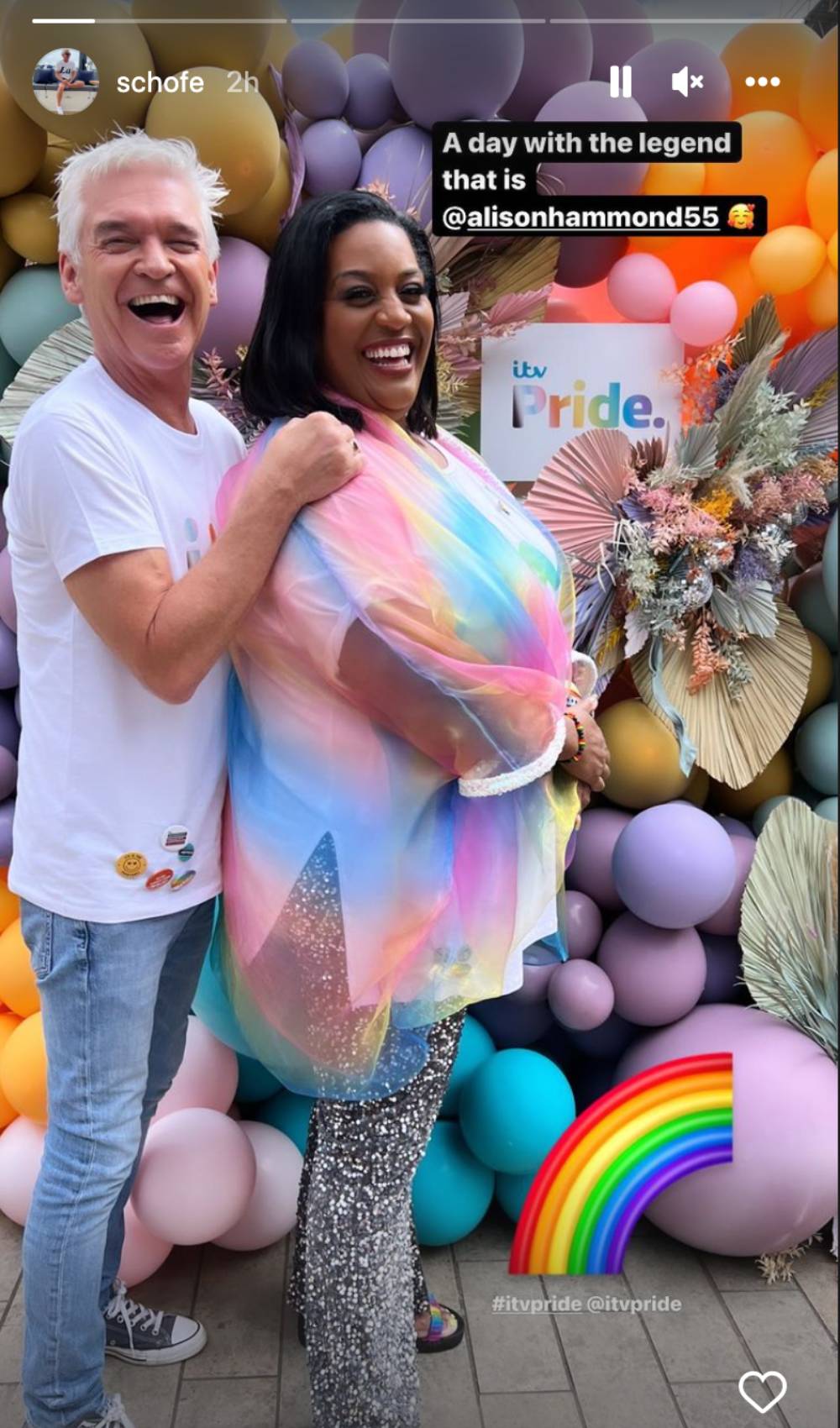 Phillip Schofield beams with Alison Hammond as he enjoys Pride parade