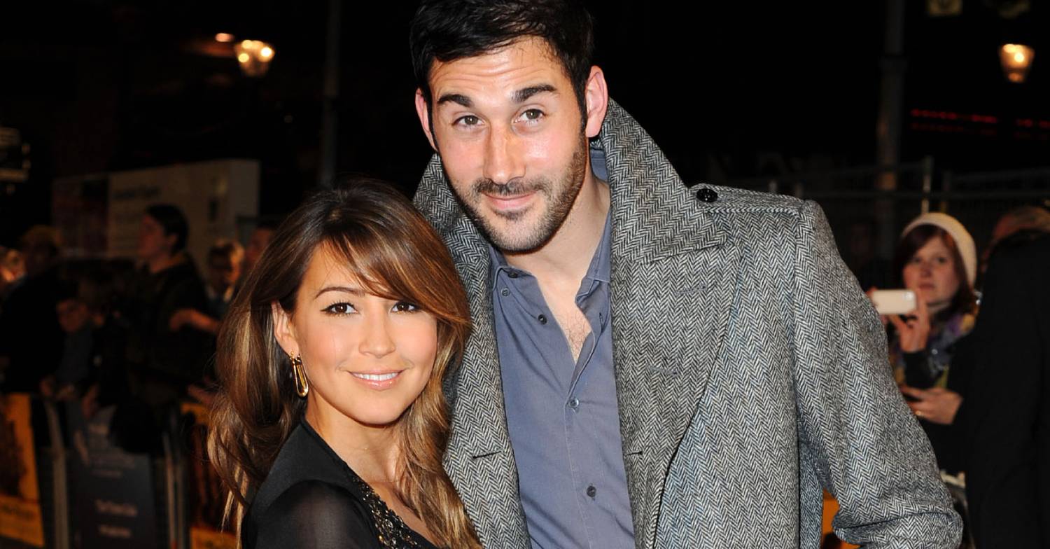 Rachel Stevens and husband Alex Bourne pose on a red carpet