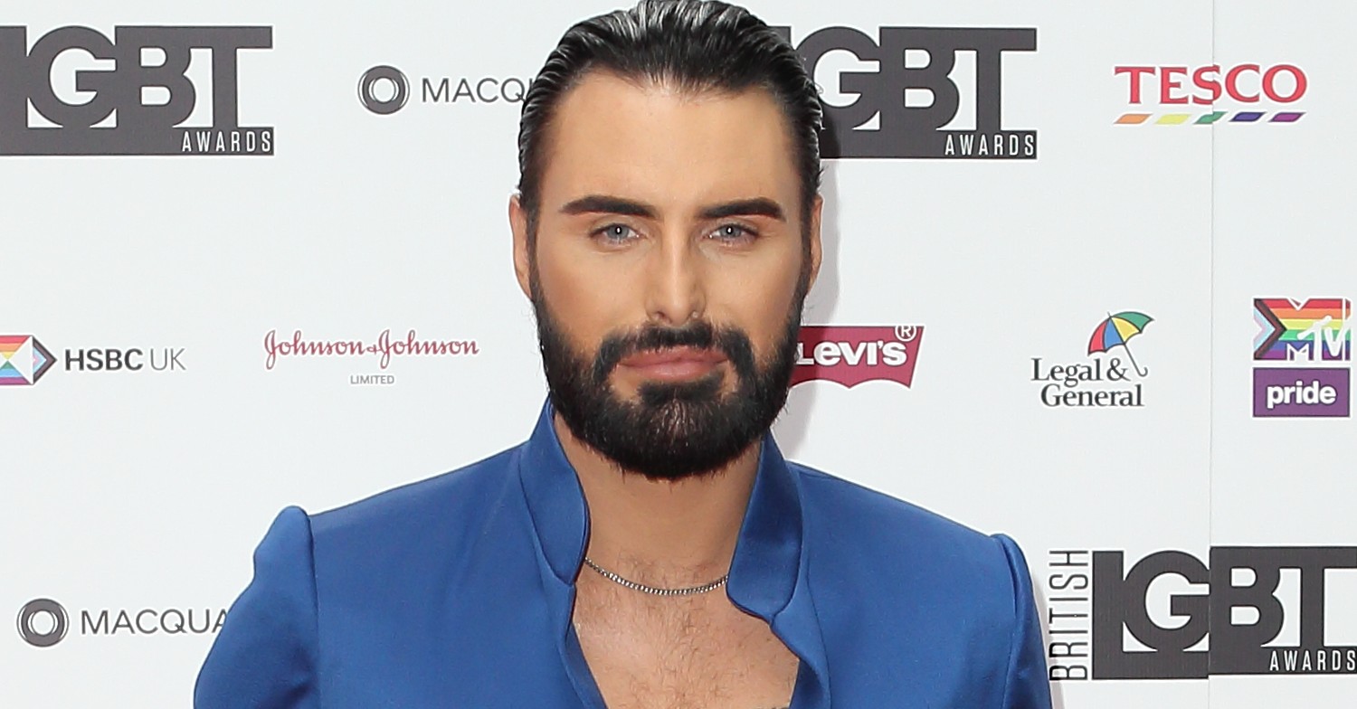 Rylan Clark smoulders at camera in blue blazer