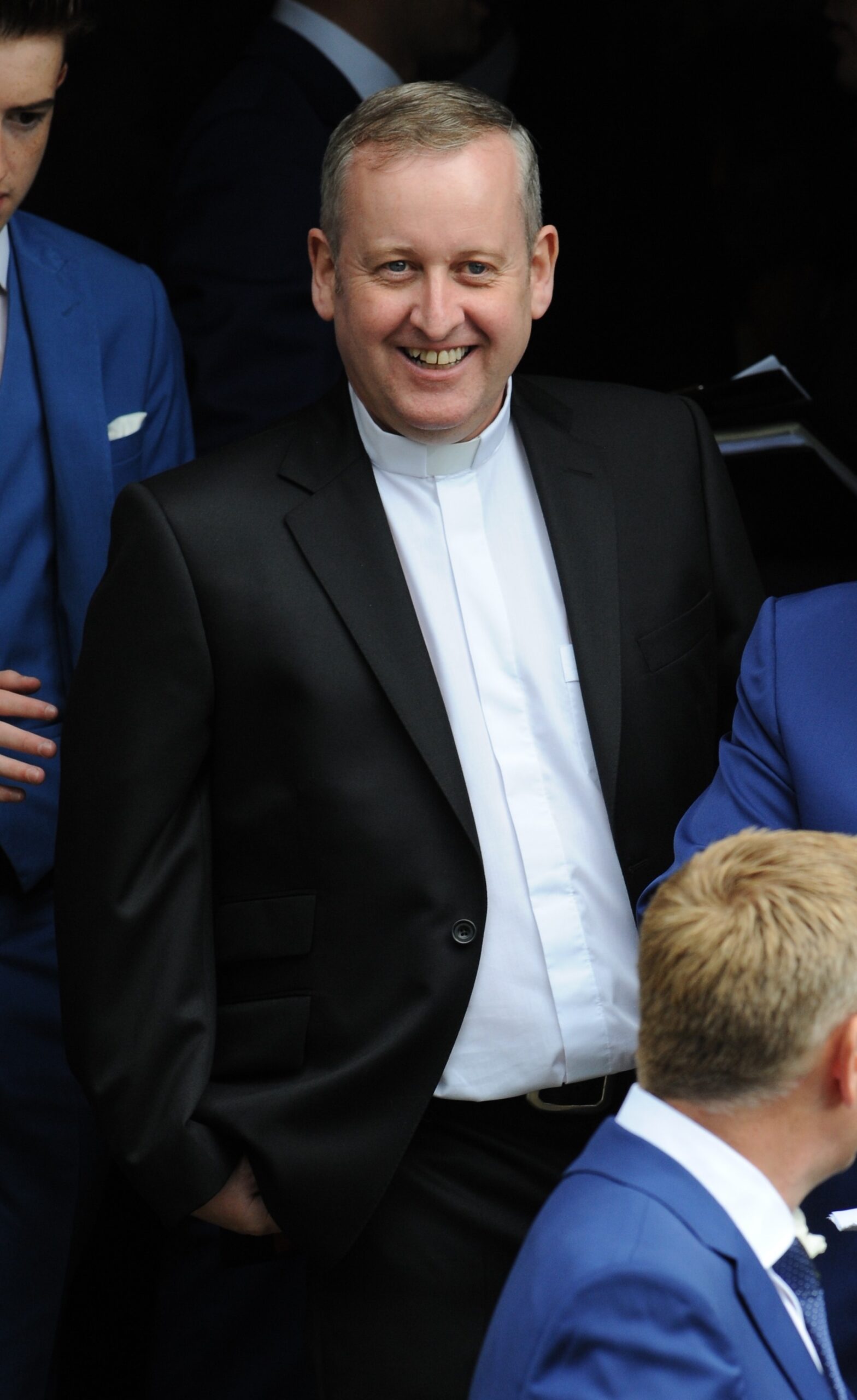Dermott Donnelly smiling at Ant McPartlin's wedding