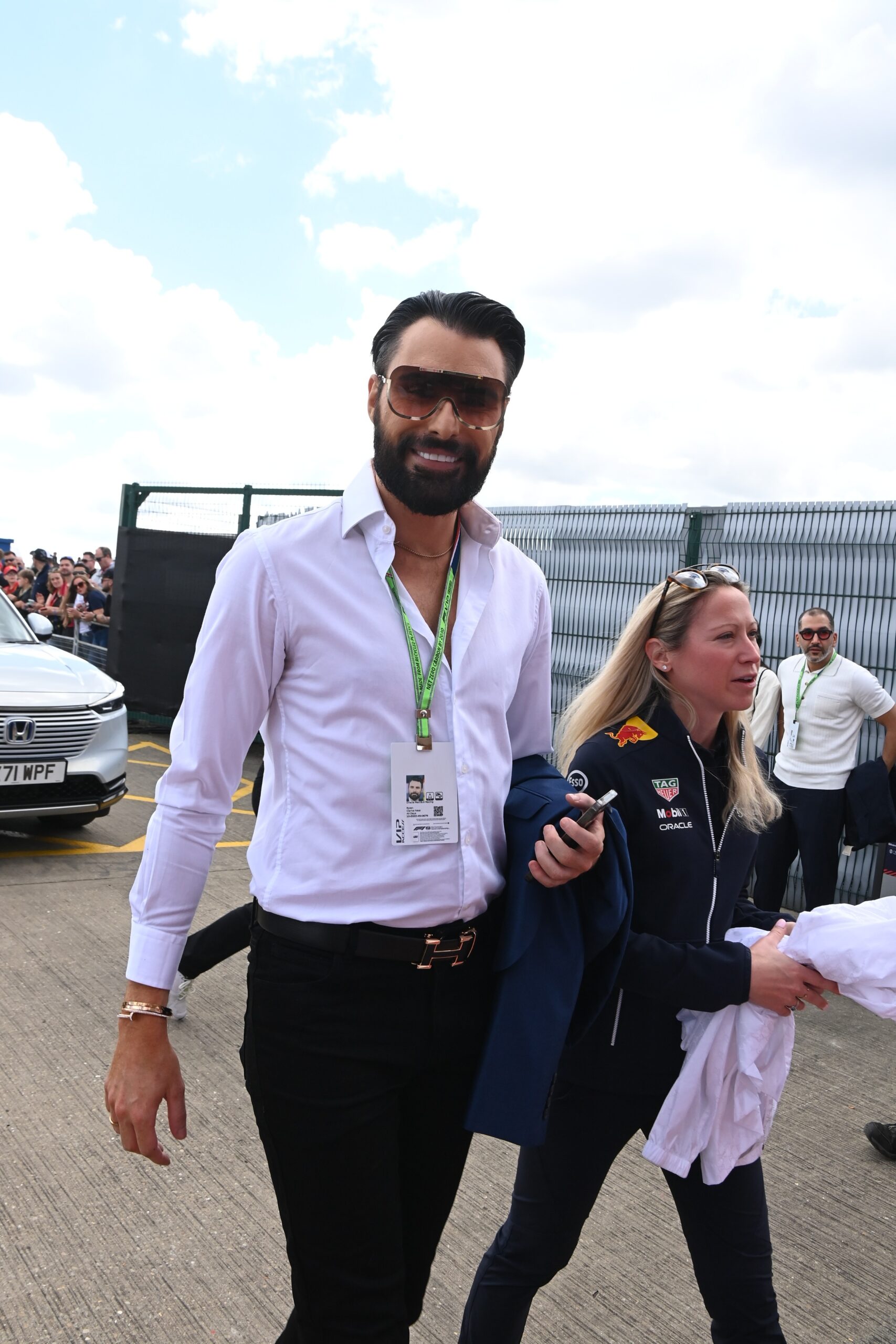 Rylan Clark wearing sunglasses and smiling
