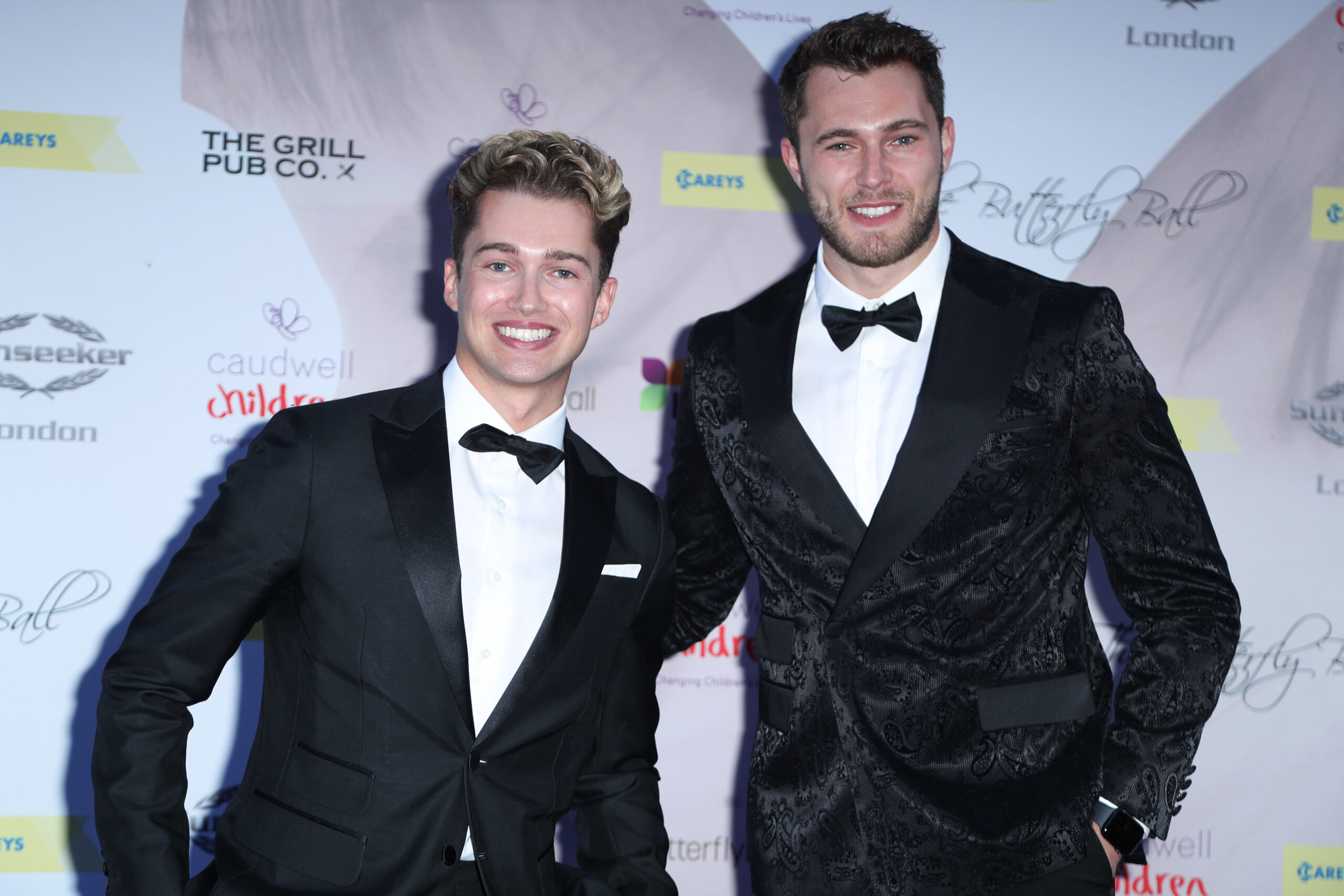 Love Island star Curtis Pritchard smiling and brother AJ