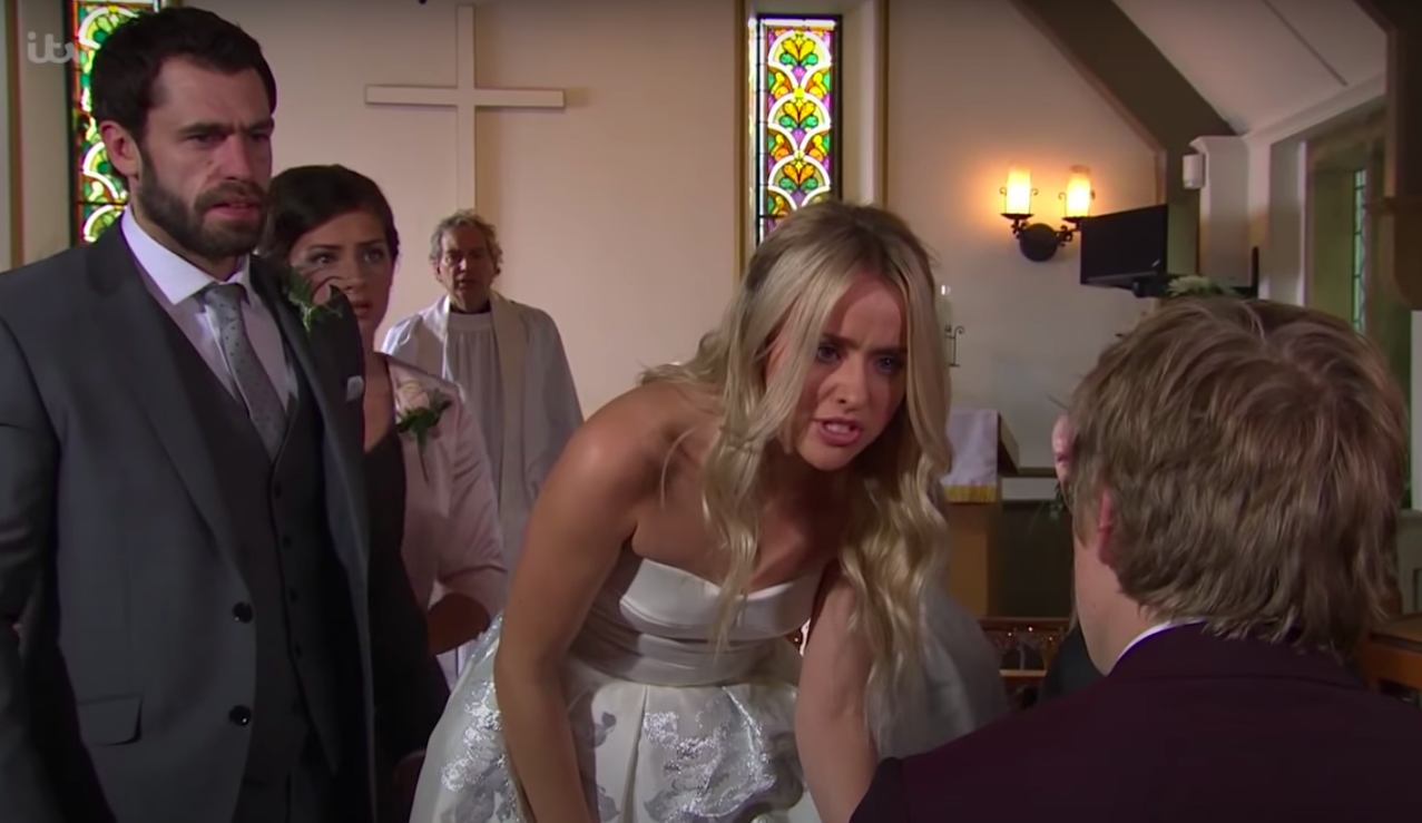 Katie shouts at Robert at her wedding to Andy in Emmerdale