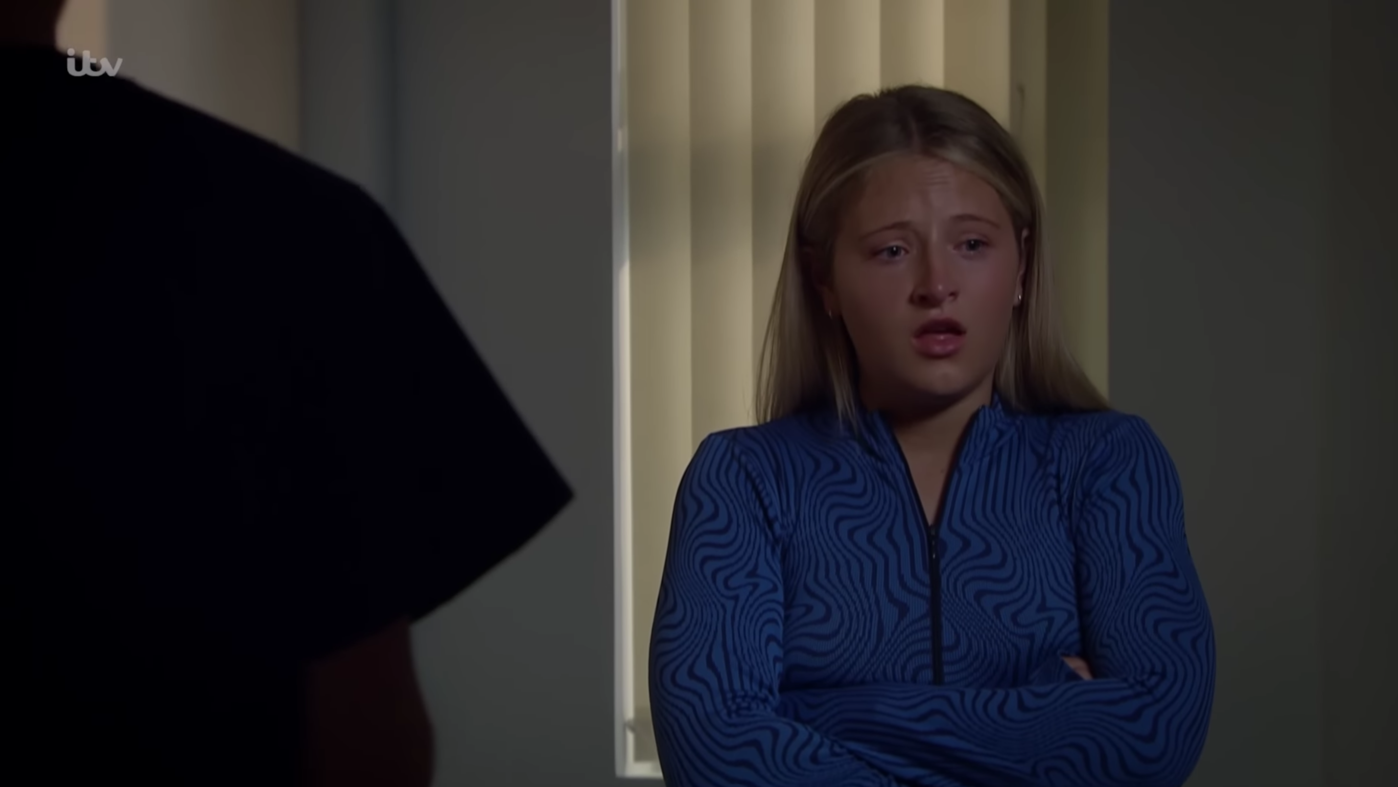 Amelia in Emmerdale looks shocked about her pregnancy (Credit: ITV)