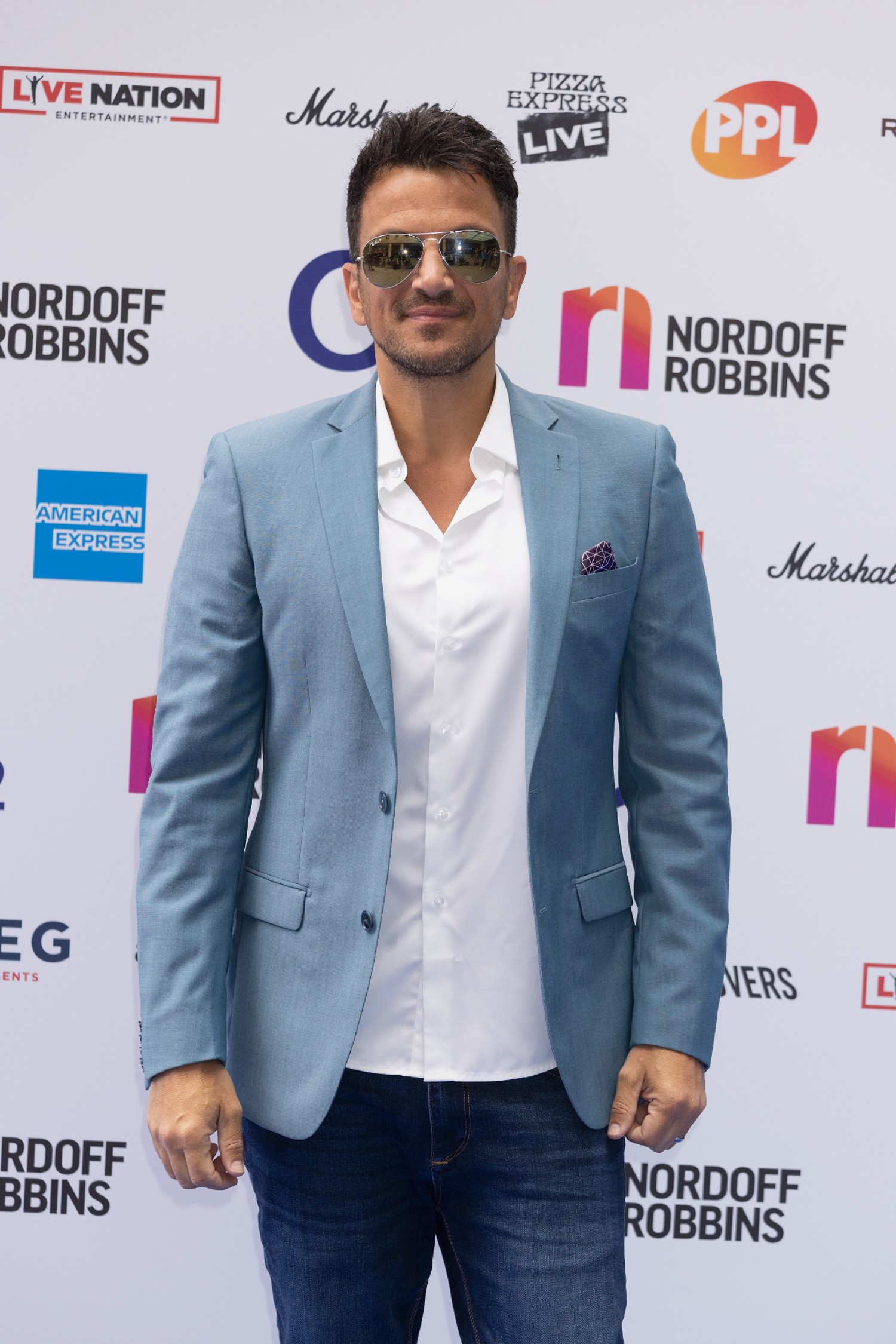 Peter Andre wearing sunglasses on the red carpet