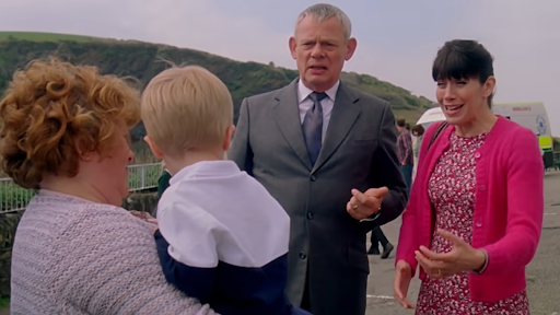 Doc Martin and Louisa reacting to their toddler son James