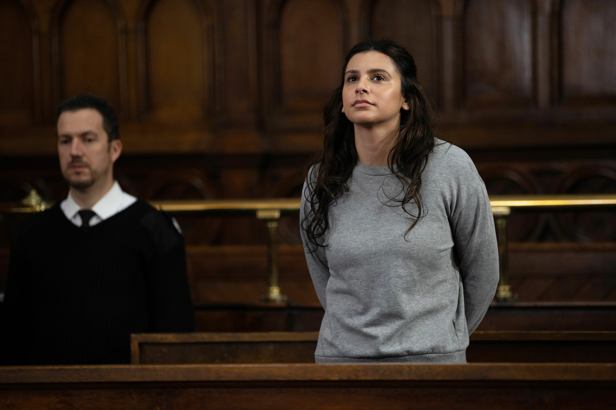 Meena Jutla standing up in court