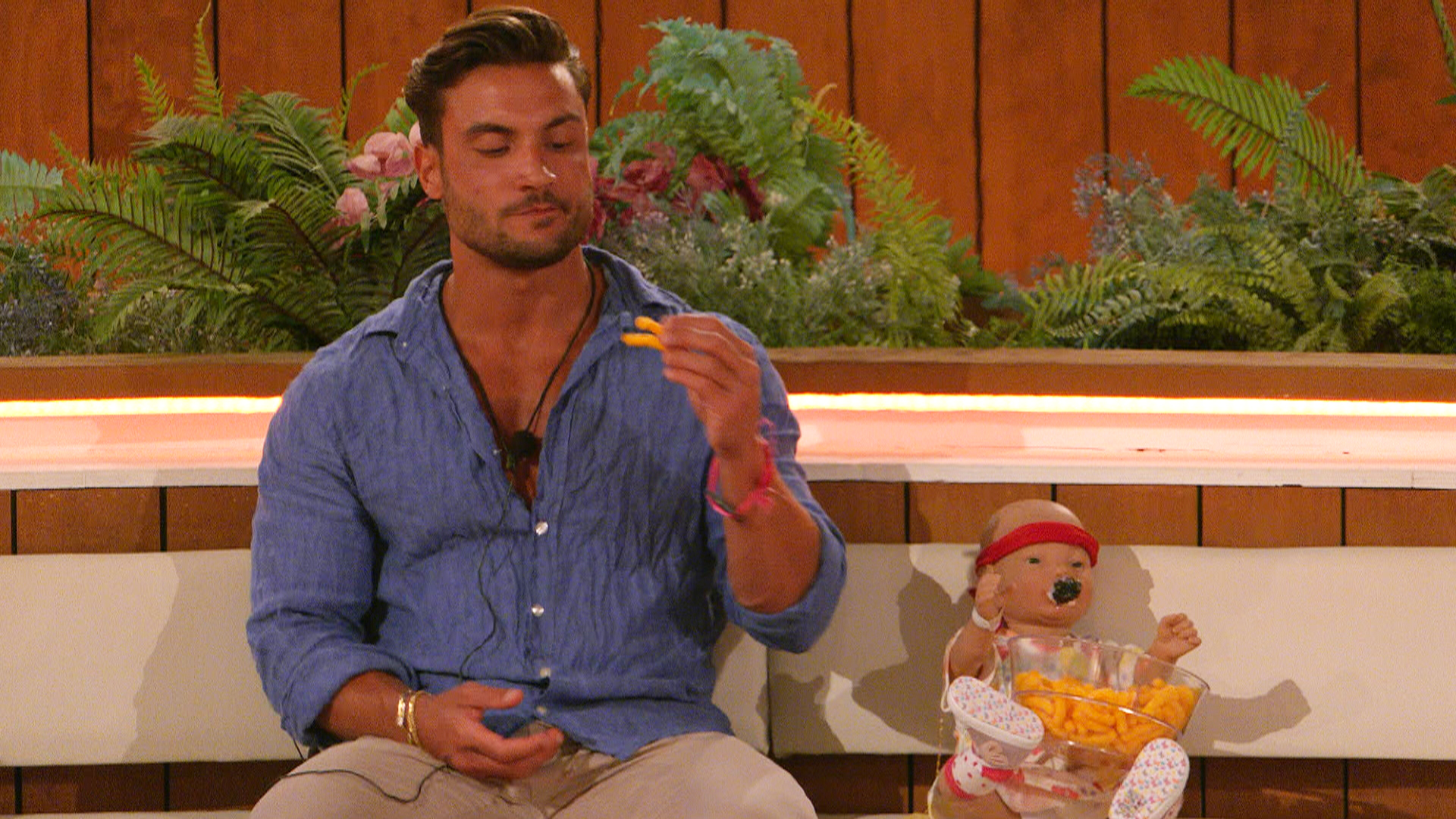 Love Island stars doing the baby challenge