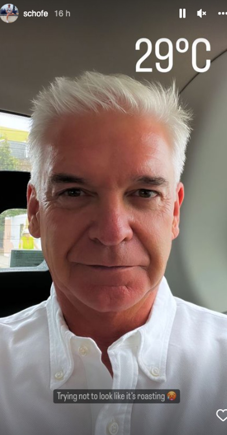 Phillip Schofield trying to avoid the UK heatwave
