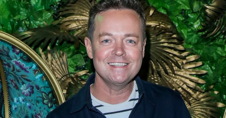 BGT star Stephen Mulhern on the red carpet wearing a striped t-shirt