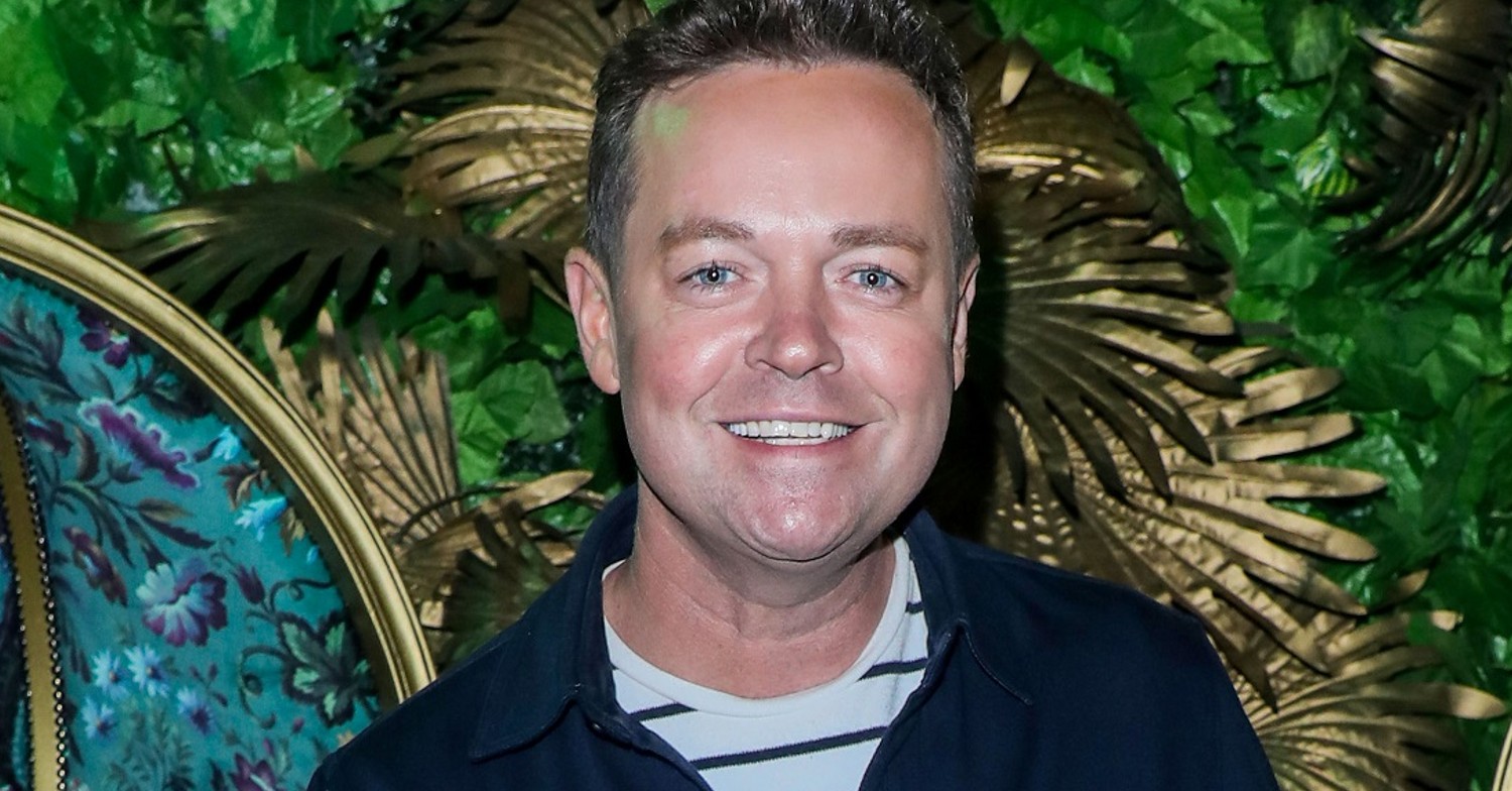 BGT star Stephen Mulhern on the red carpet wearing a striped t-shirt
