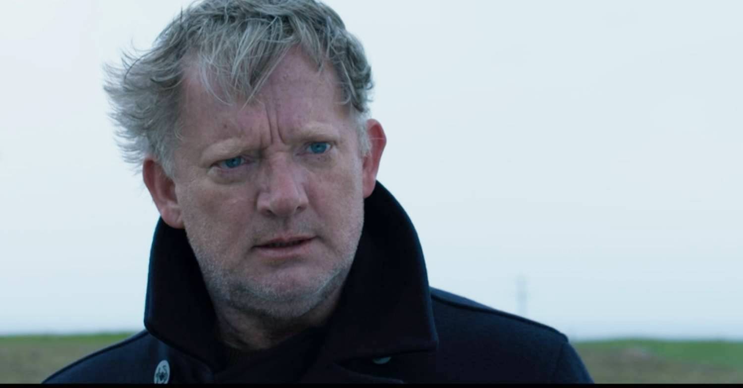 Douglas Henshall as Jimmy Perez in Shetland looks windswept